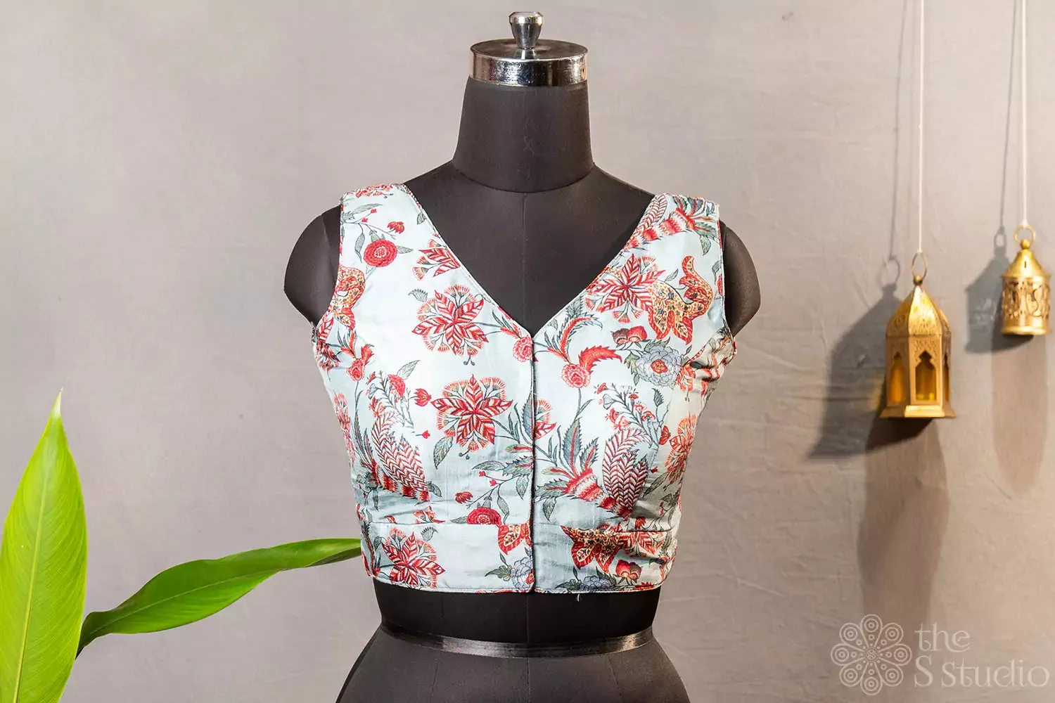 Light  blue floral printed sleeveless semi silk  readymade blouse